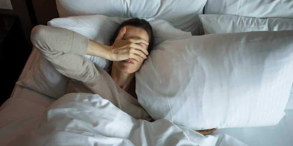 Femme ayant du mal à dormir