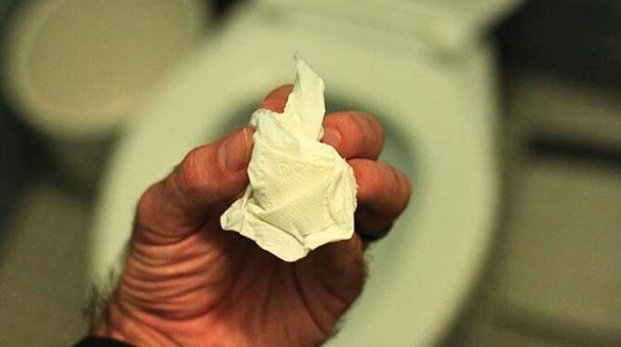 Illustration d'une personne aux toilettes